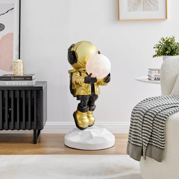 HADFIELD TAKES THE MOON // LIGHTED ASTRONAUT- SCULPTURE // BLACK & GOLD - URBAN FURNITURE & GENERAL MERCHANDISE